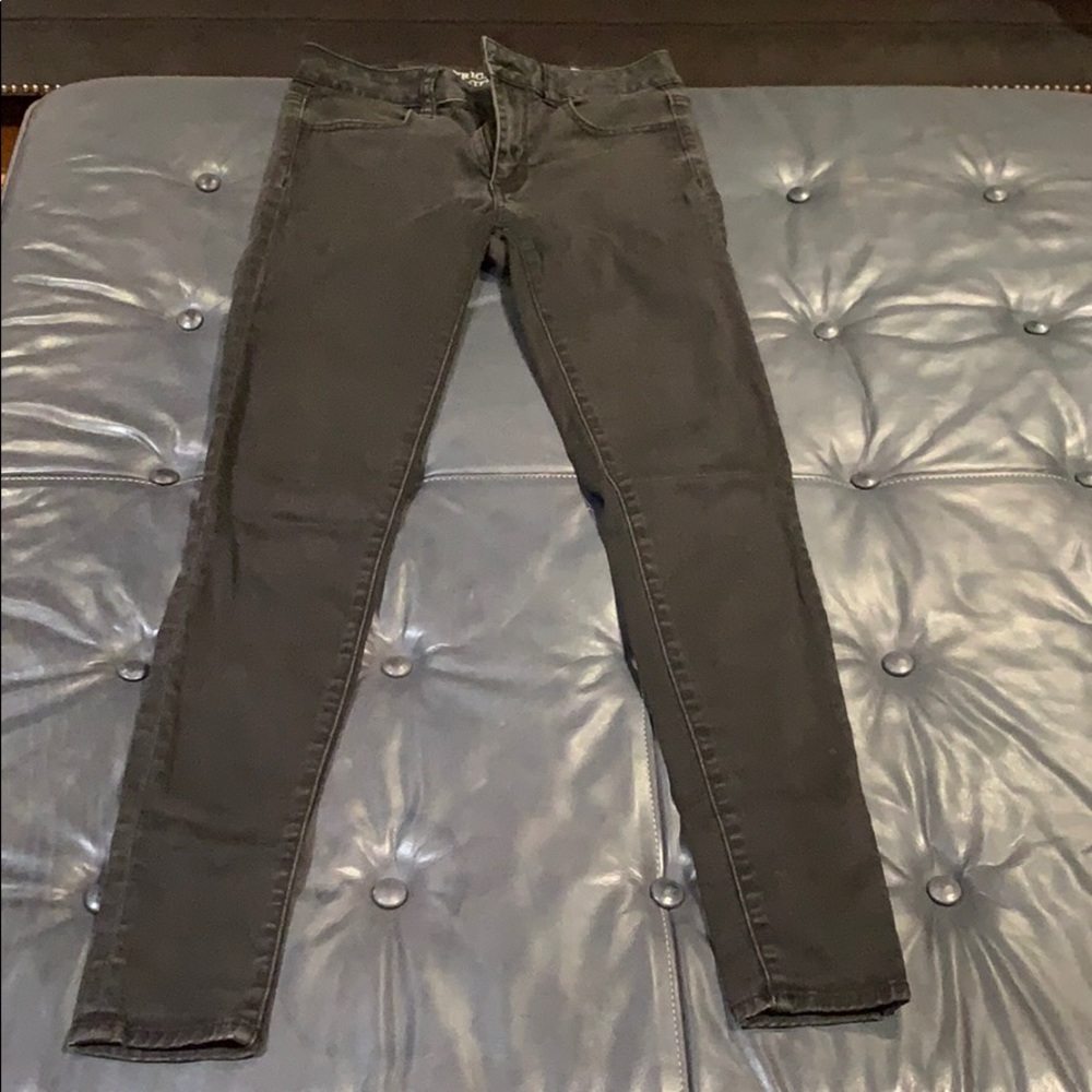 Low cut faded black jeans